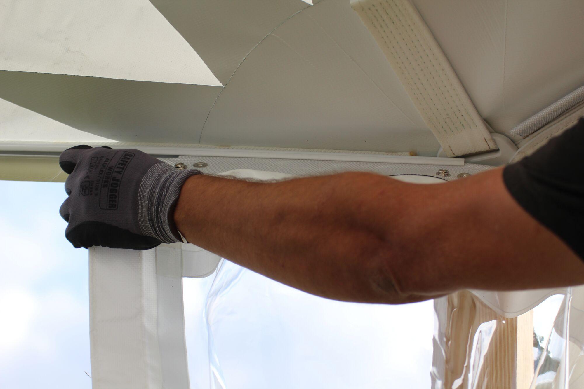 Sailcloth rail for sidewall